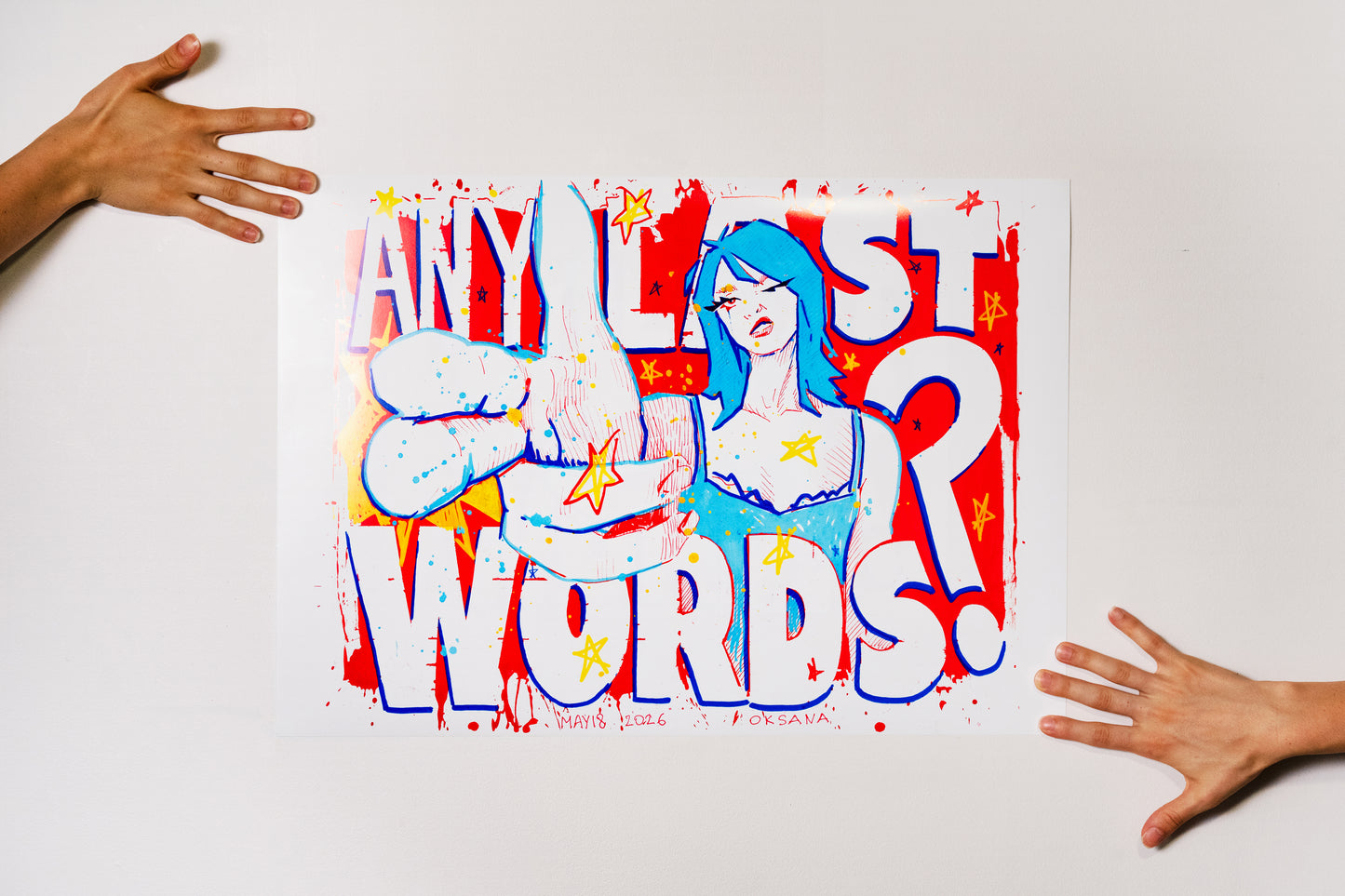 A2 poster print of ANY LAST WORDS? artwork held on a white wall