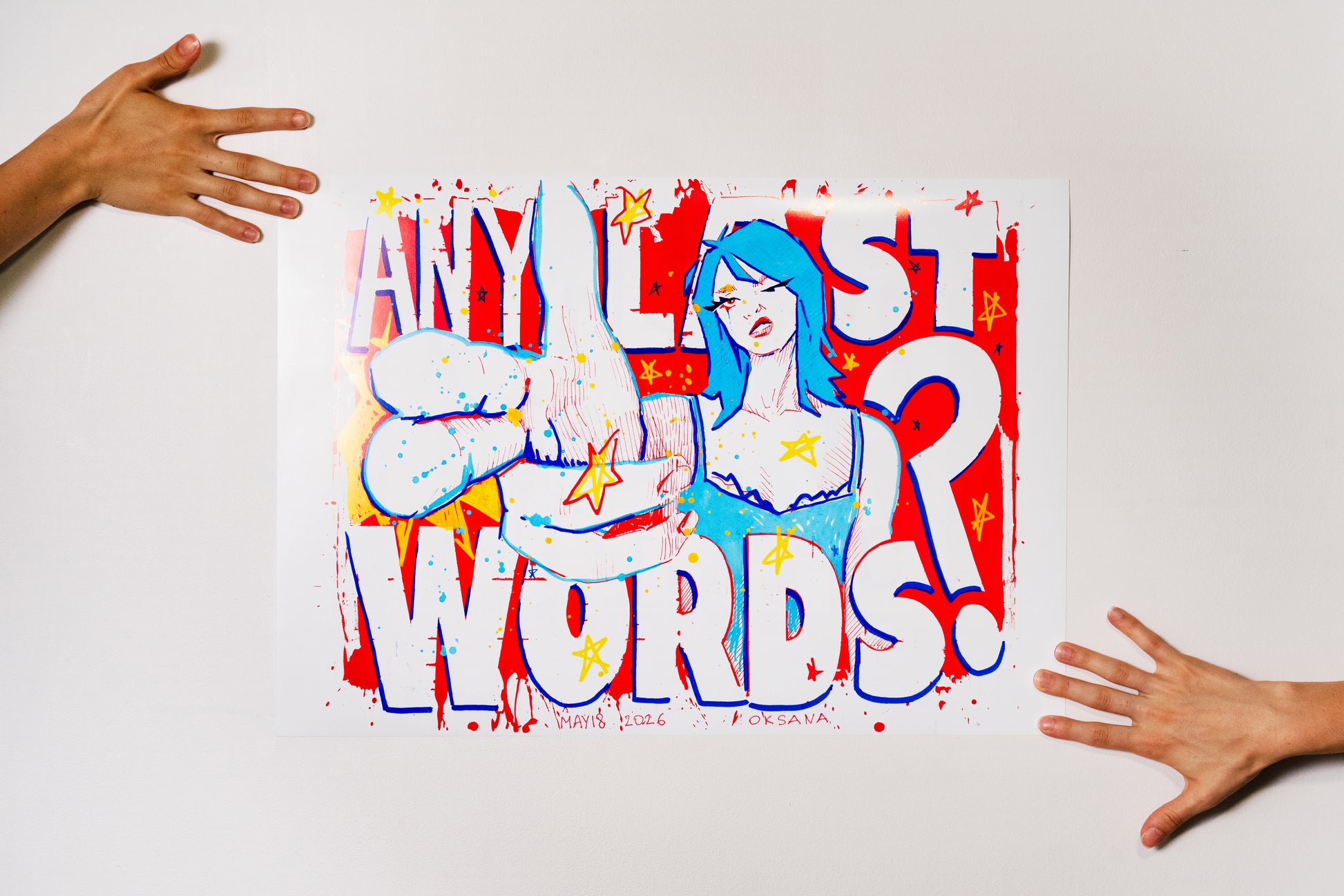 A2 poster print of ANY LAST WORDS? artwork held on a white wall