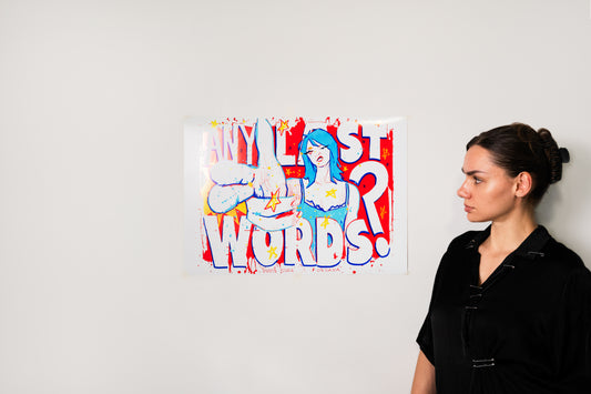 ANY LAST WORDS? A2 poster print displayed on a white wall next to the artist