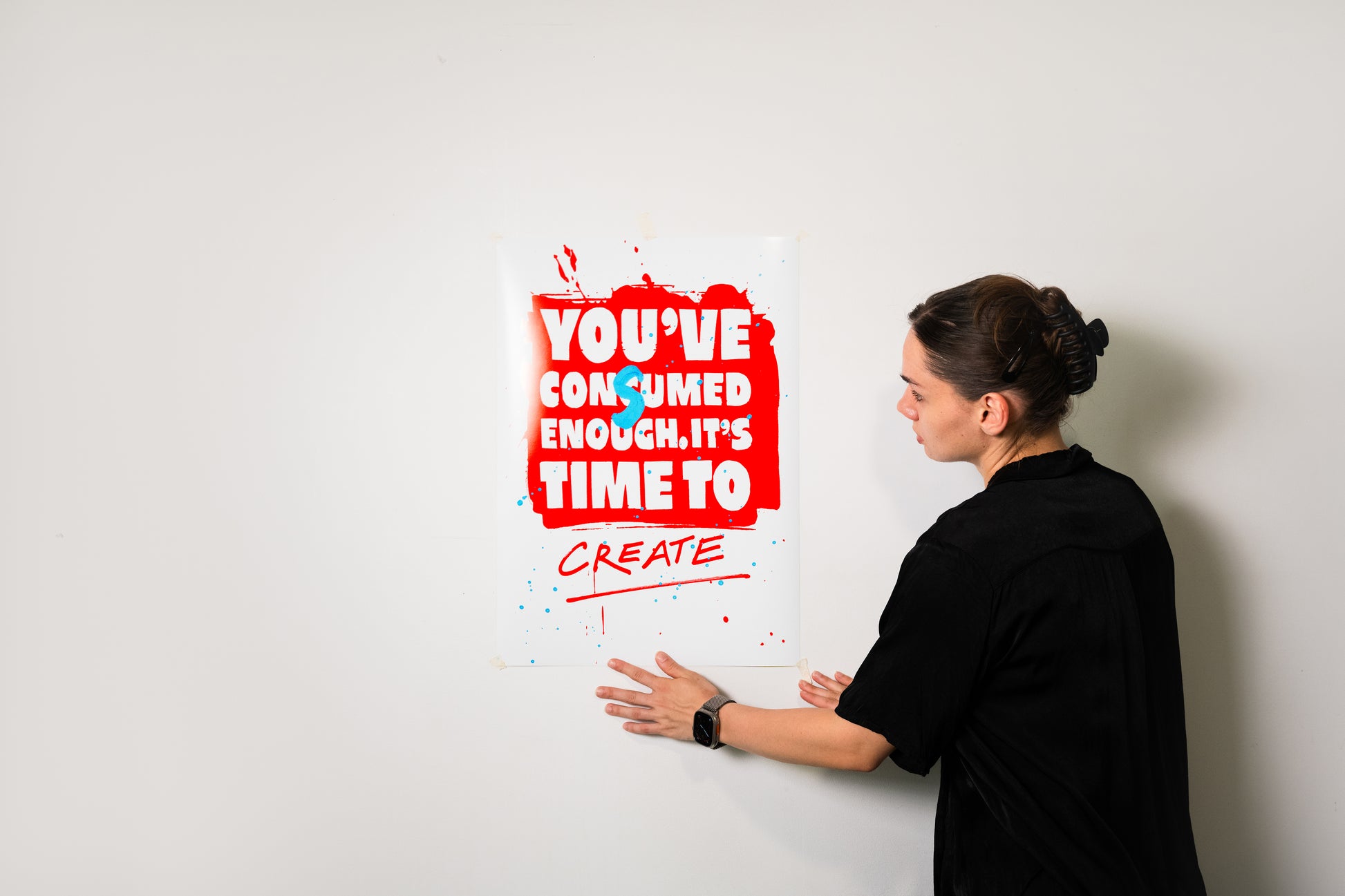 IT’S TIME TO CREATE A2 poster print displayed on a white wall next to the artist